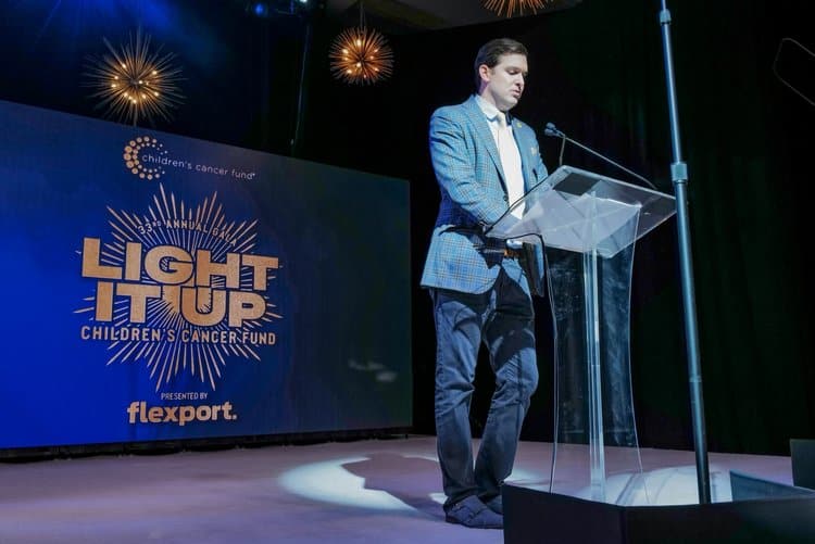 A man standing at a podium talking
