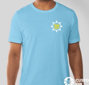 Adult in light blue t-shirt that says kids deserve more hope - front view