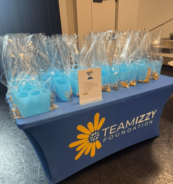 A table full of gift bags