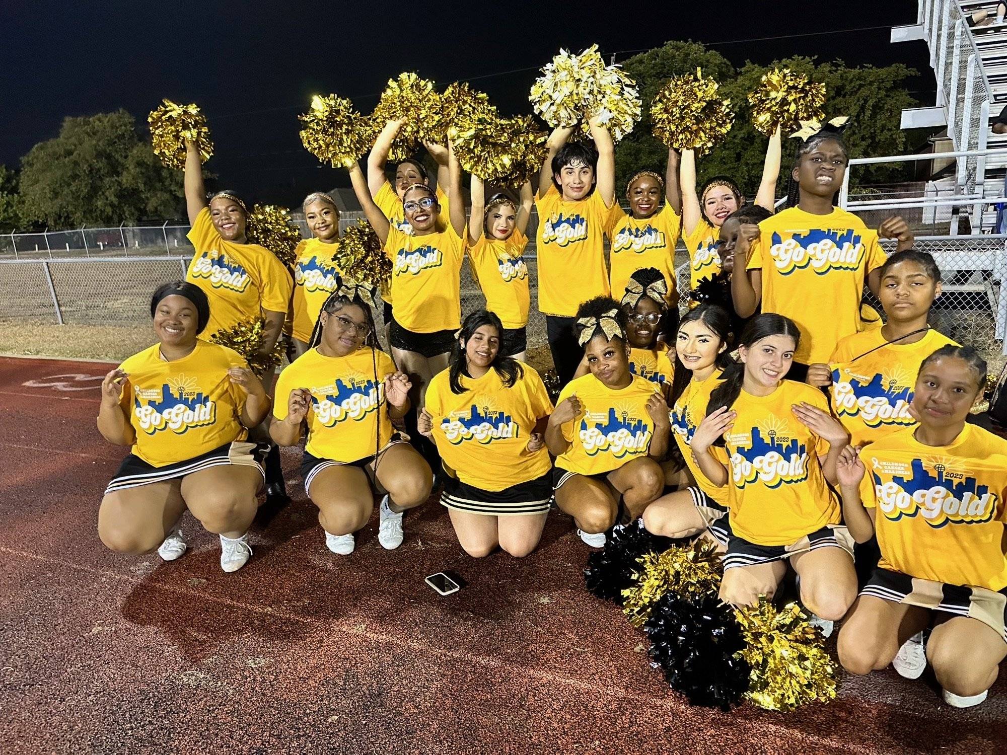 group of children with pompoms