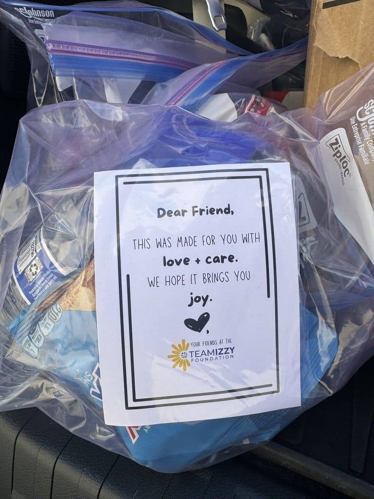 a gift bag with a note on it