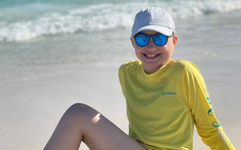 a person sitting at the beach
