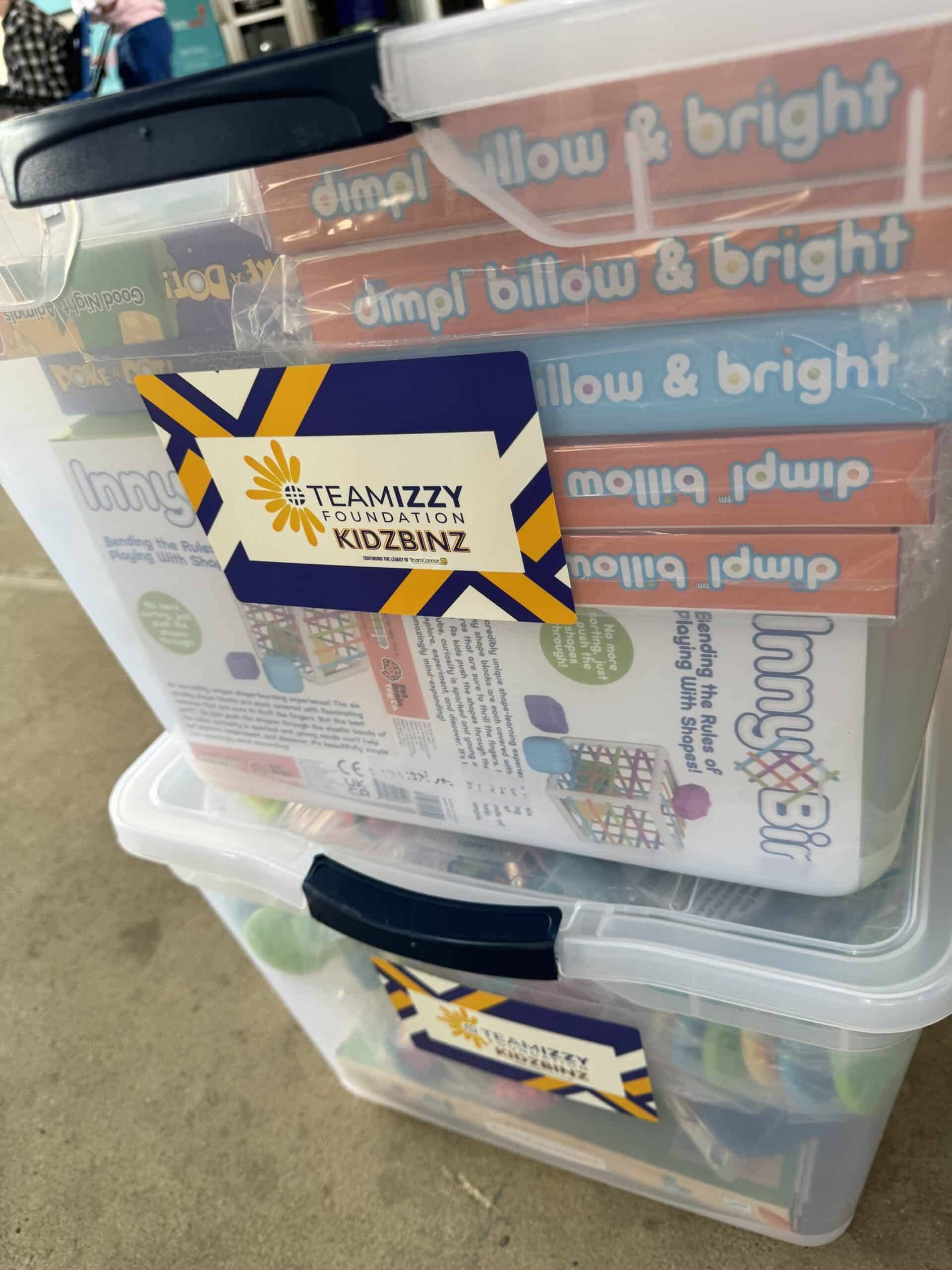 A plastic bin filled with books